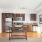 Galley style kitchen with an abundance of storage, counter space, and natural light