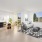 Brilliant open concept living room with dining space with adjacent  patio